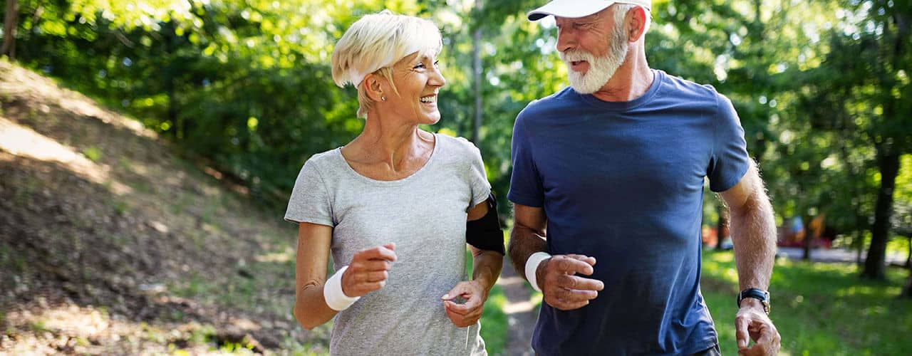 couple jogging outdoors. 