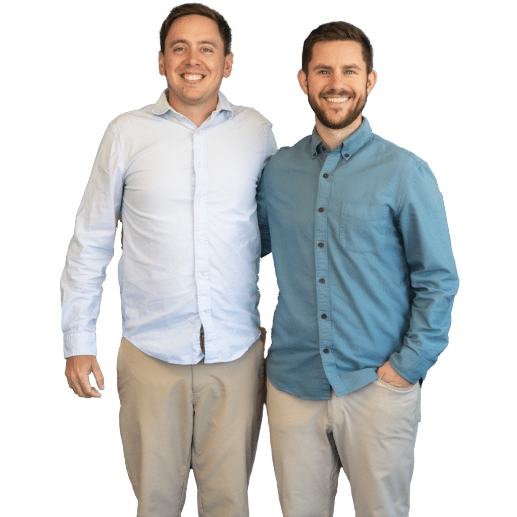 Dr Taylor Moore and Dr Evan Norum standing next to each other posing.