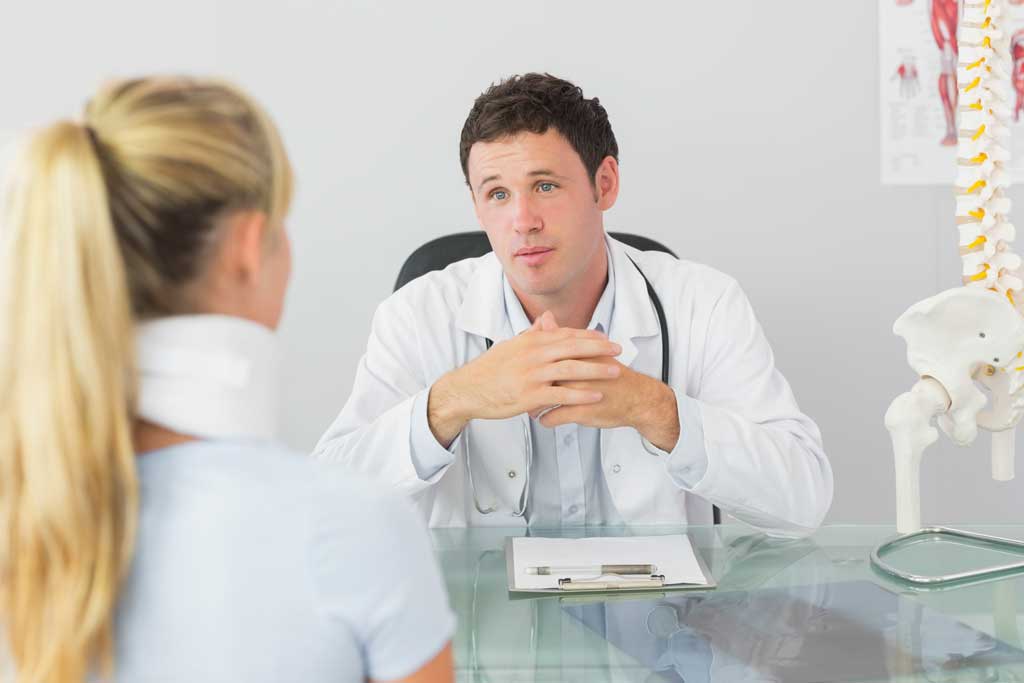 Patient interviewing a chiropractor