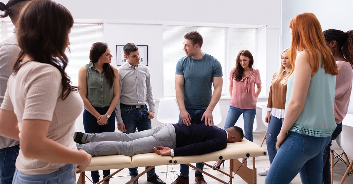 doctor teaching students in a classroom.