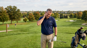 man with a sore neck on the golf course in new berlin wi